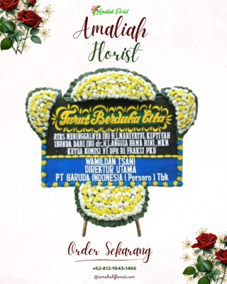 Papan Bunga Duka di Tolikara