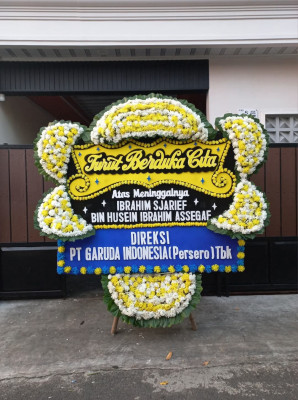 Papan Bunga Duka di Tolikara